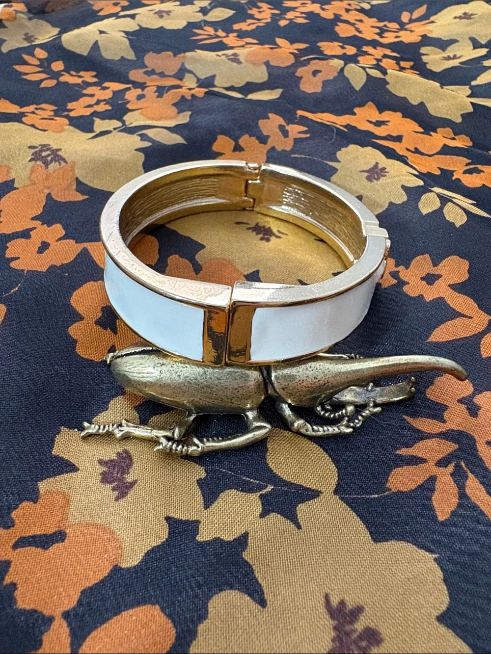 White Enamel Hinged Bangle Bracelet with Geometric Plumeria Accent